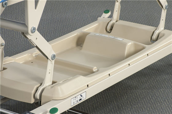 Système de levage manuel des rails pliables pour le transfert des brancards